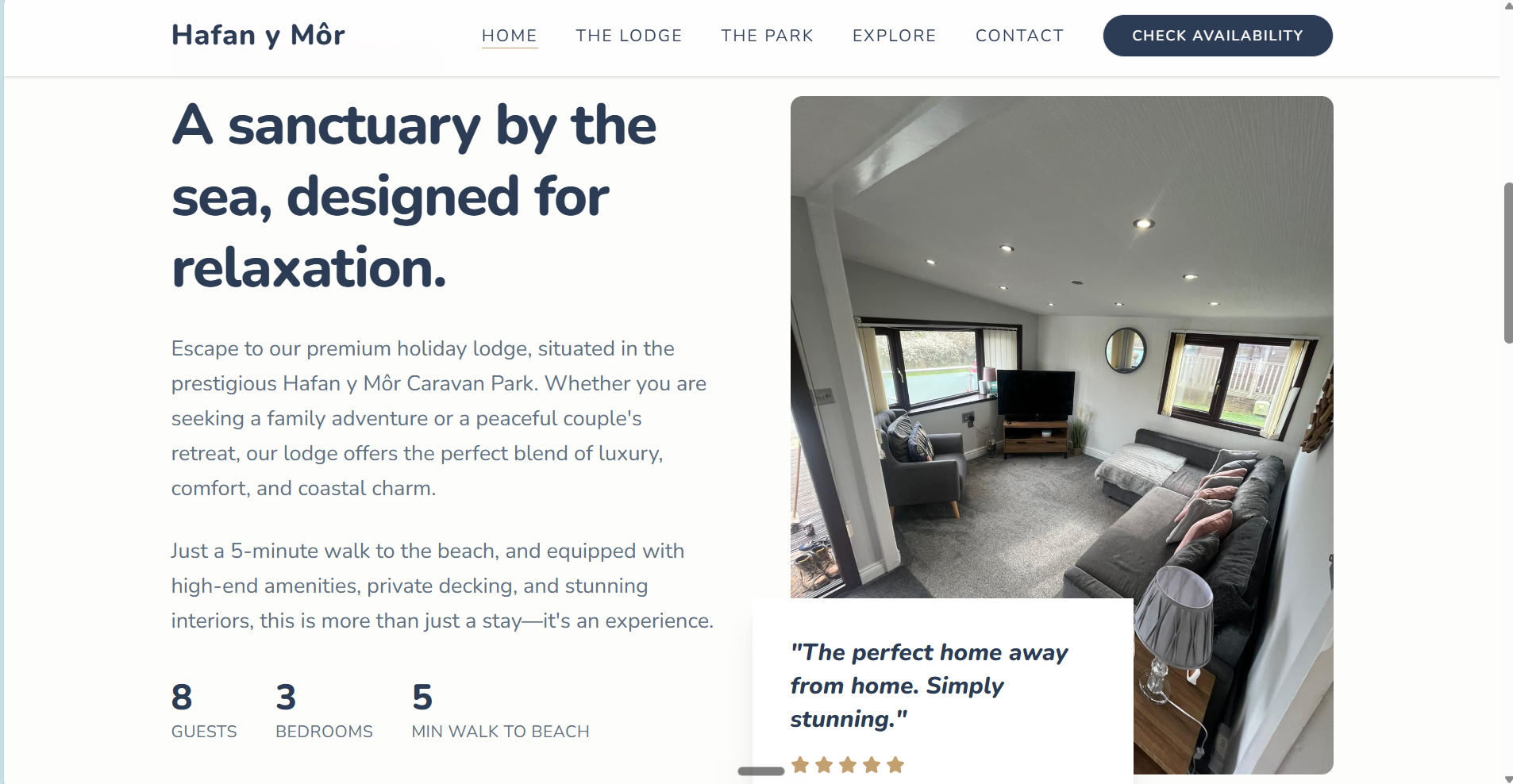 Hafan y Môr lodge homepage: 'A sanctuary by the sea, designed for relaxation' – premium holiday lodge at Hafan y Môr Caravan Park, with a photo of the lodge living room, a guest review, and lodge stats (8 guests, 3 bedrooms, 5 min walk to beach).